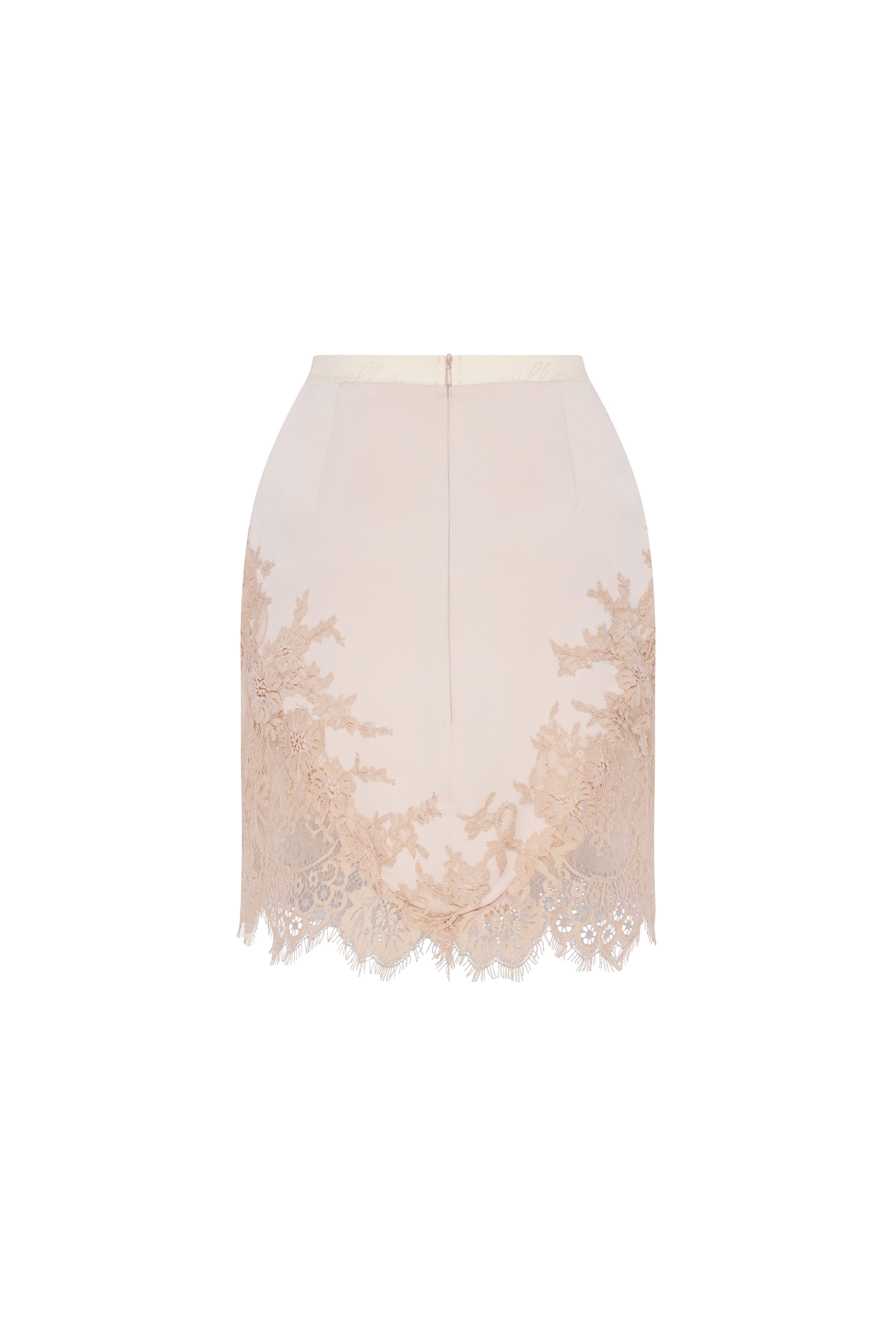 Облягаюча бежева мініспідниця, оздоблена мереживом