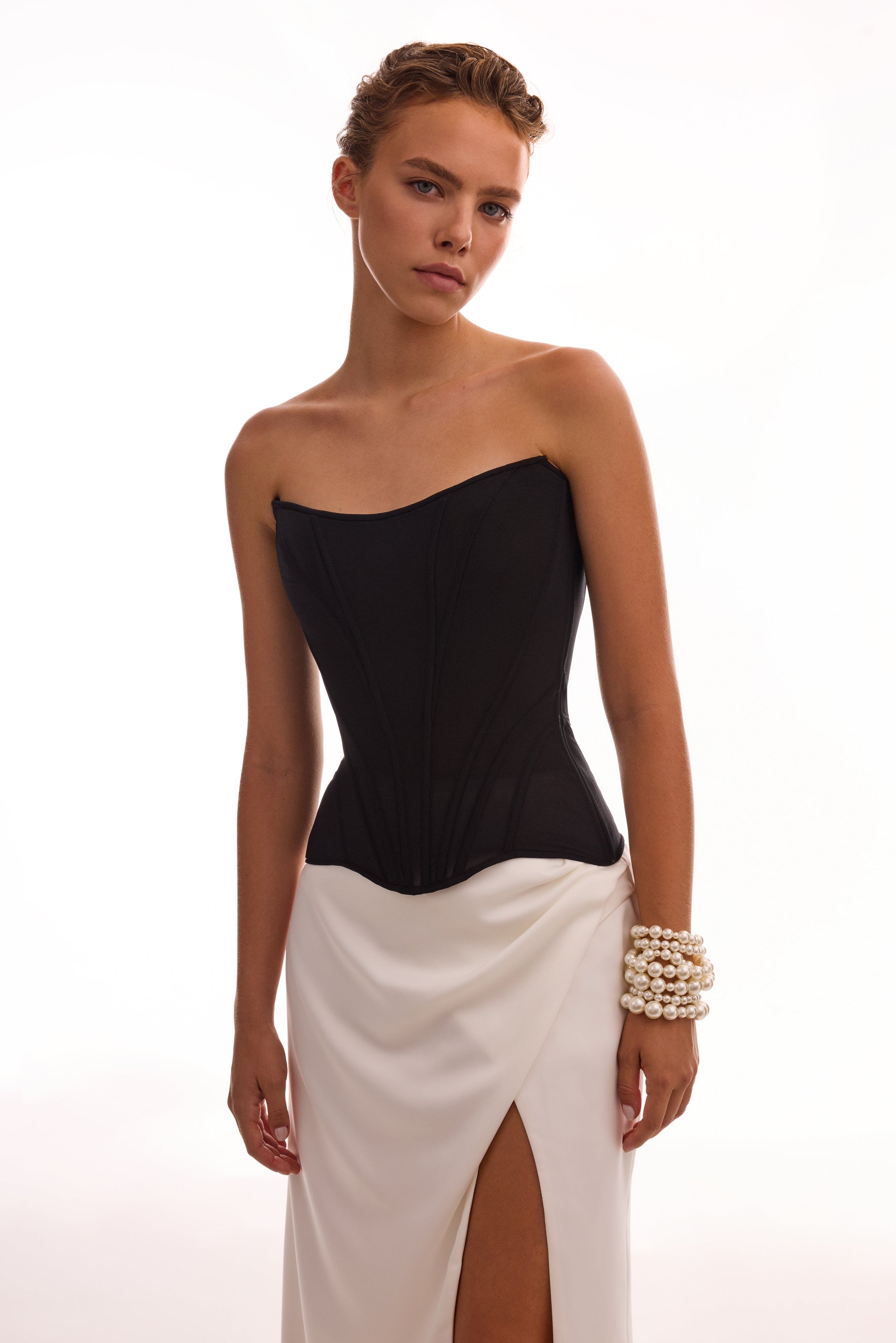 Біла спідниця максі з розрізом