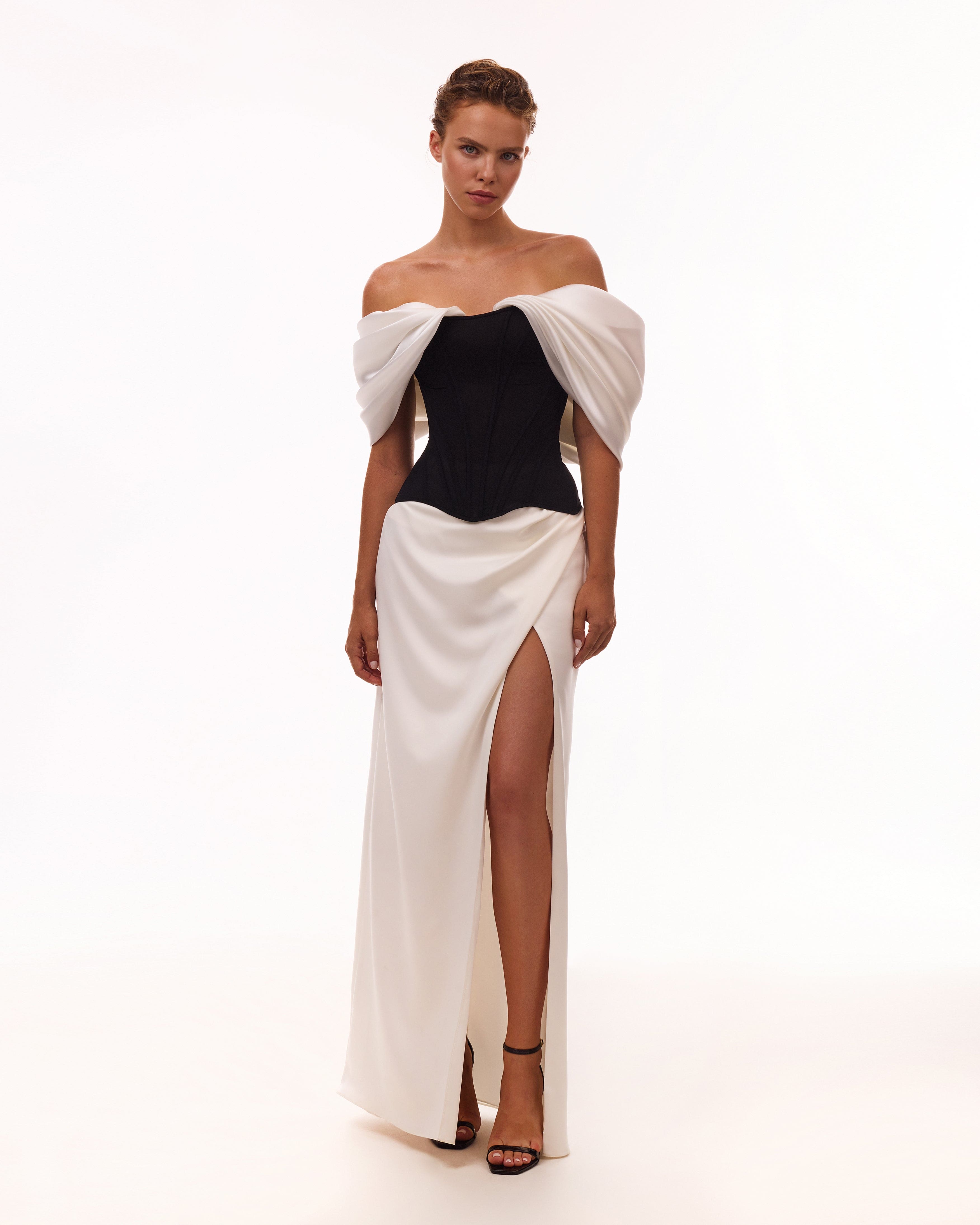 Біла спідниця максі з розрізом