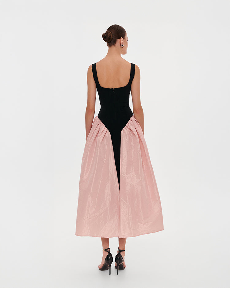 Чорна корсетна сукня із блискучою рожевою спідницею міді