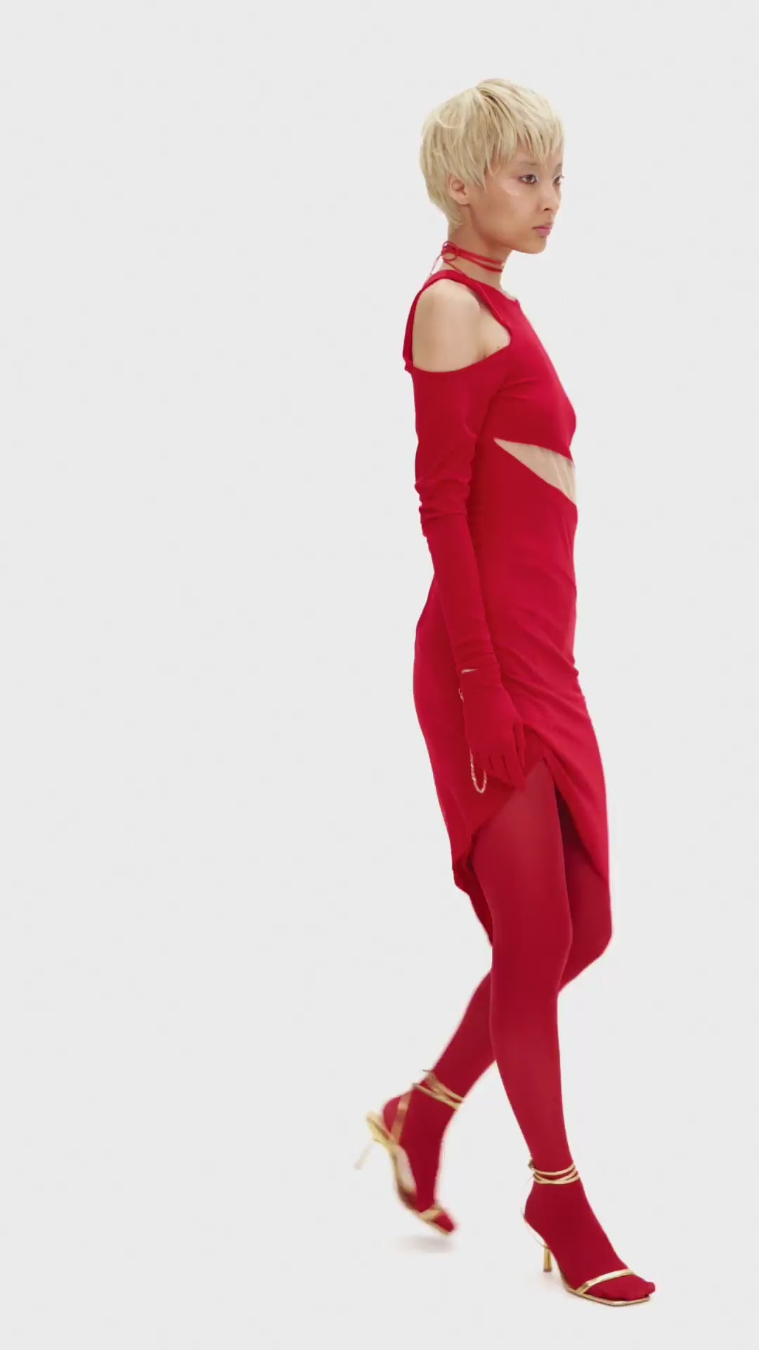 Асиметрична червона мідісукня