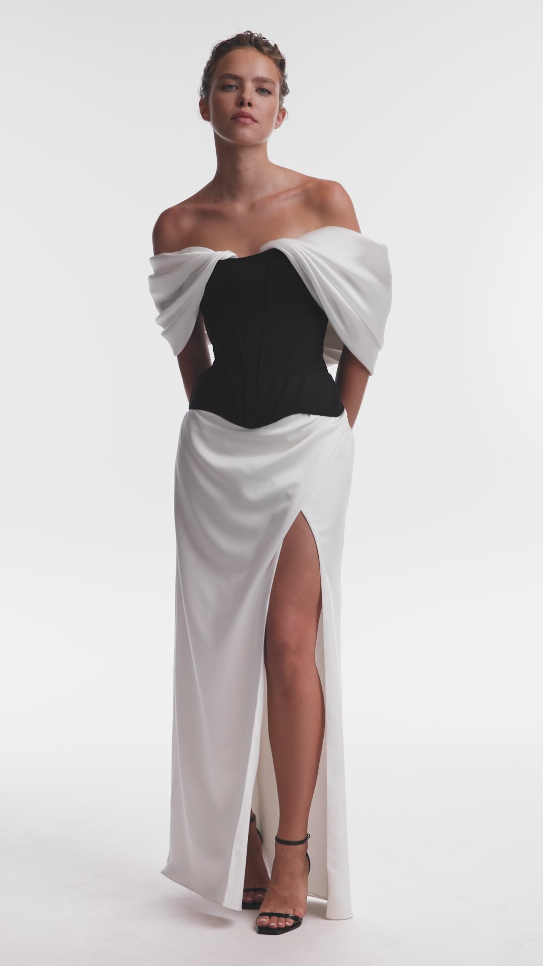 Біла спідниця максі з розрізом