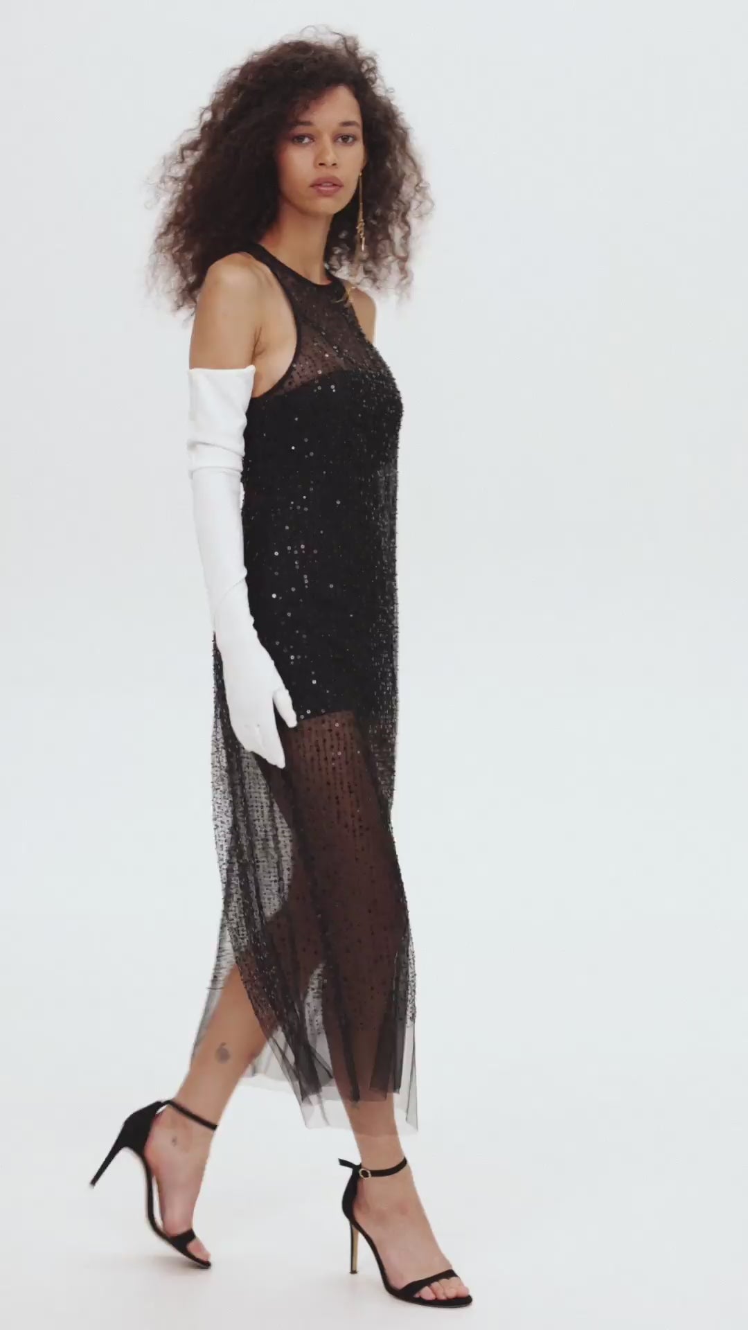 Чорна максісукня з напівпрозорого блискучого мережива