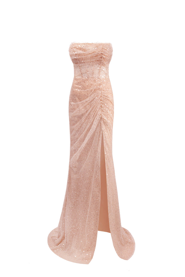 Сукня золотого кольору вкрита блискучими лелітками