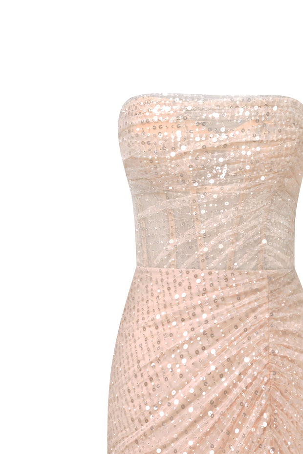 Сукня золотого кольору вкрита блискучими лелітками