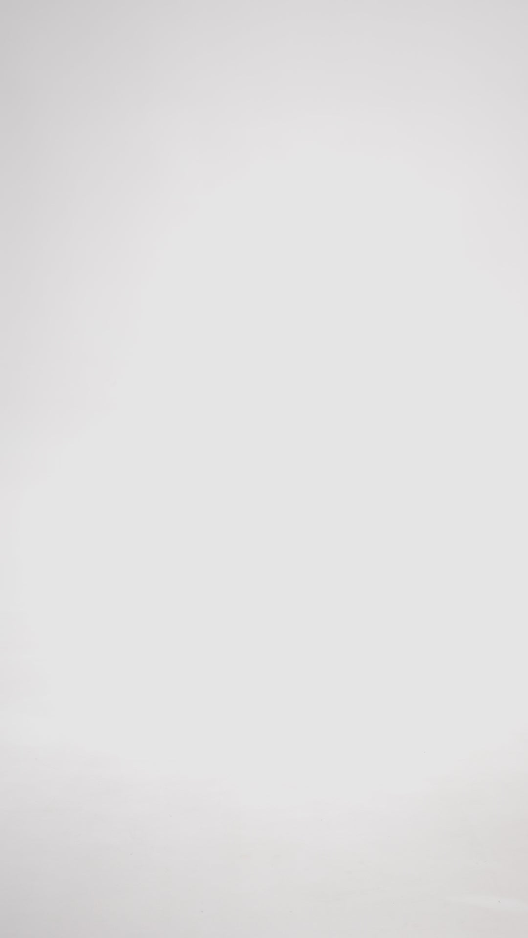 Приталена нюдова сукня міні з бантиками